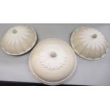 Group of three mid 20th Century painted composition ceiling roses, the largest 46cms diameter