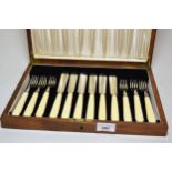 Cased set of six silver fish knives and forks with simulated ivory handles