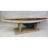 Model pond yacht hull, 92.5cms long with stand