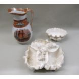 Two large Copeland creamware floral encrusted bowls (at fault) and a large jug having transfer