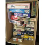 Box of twenty various unbuilt model kits, mainly aircraft