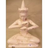 Thai white painted wooden figure of seated buddha