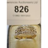 9ct Yellow gold diamond set dress ring of pierced design, size 'P', 3g