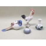 Royal Copenhagen figure of a frog on a rock, two B & G figures of birds and a Royal Copenhagen