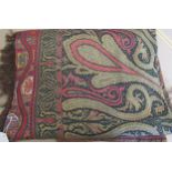 Machine woven paisley table cover with a twin medallion and all-over design with decorative end