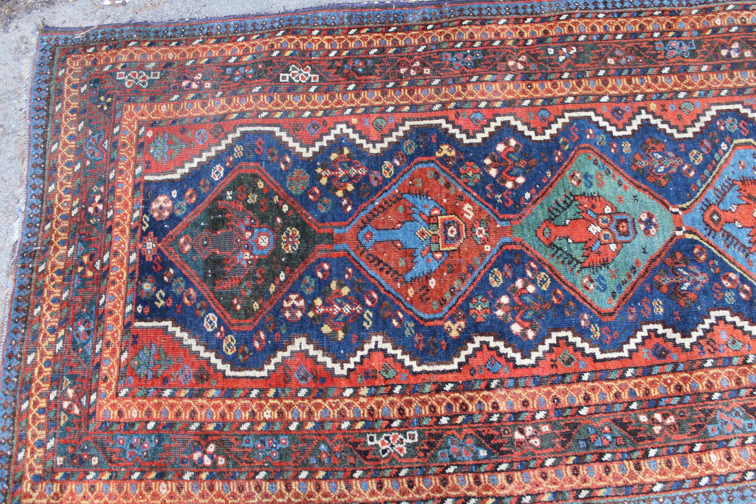Afshar runner with a repeating polychrome pole medallion design on a midnight blue ground with - Image 2 of 5