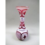 Bohemian white overlaid red glass baluster form narrow neck vase, 32cm high