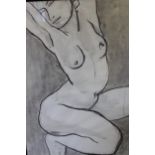 Two framed charcoal drawings, reclining nude females, bearing monogram, framed, 73cms x 54cms each