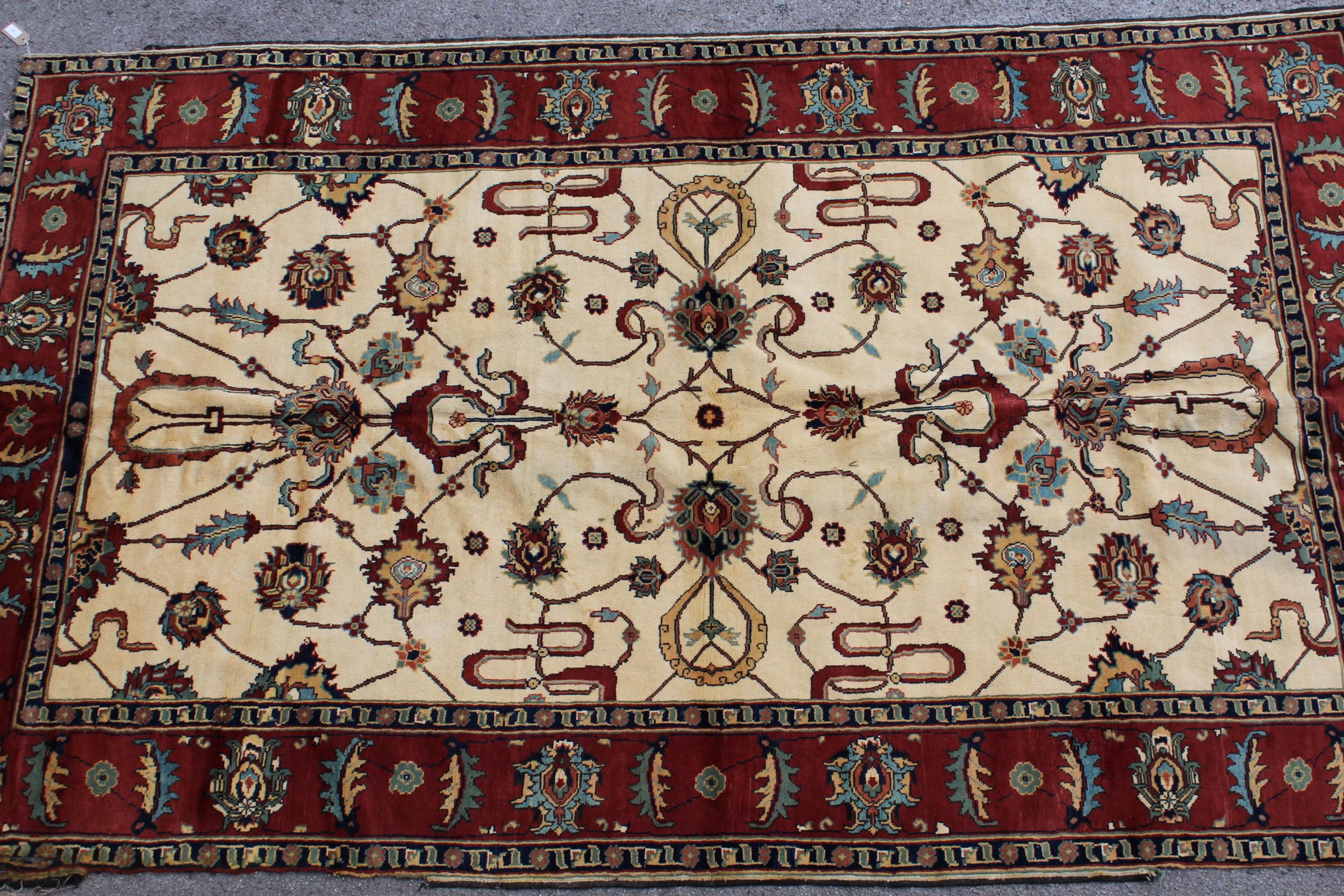 Modern Turkish carpet with an all-over palmette design, on ivory ground with rust ground borders (