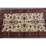 Modern Turkish carpet with an all-over palmette design, on ivory ground with rust ground borders (