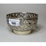 Small Japanese silver bowl of pierced floral and dragon design, 11cms diameter, 172g, marks to base