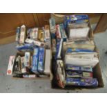 Three boxes containing a collection of unbuilt model aircraft kits including Airfix, Revell, Frog