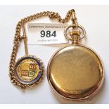 Gold plated hunter pocket watch with a small 9ct yellow gold watch chain and attached gilt fob
