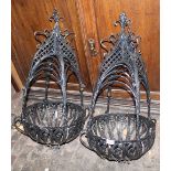 Pair of 20th Century black painted wrought iron hanging baskets, each approximately 80cm high