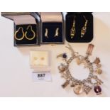 Silver charm bracelet, pair of 9ct gold amethyst set drop earrings and three other various pairs
