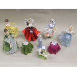 Nine various modern porcelain figures by Doulton, Royal Worcester and others