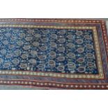 Kurdish runner with an all-over Boteh design on a blue ground with triple border, 465 x 120cm