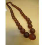 Baltic amber graduated bead necklace, size of largest bead 15mm, smallest bead 8mm