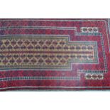 Belouch prayer rug with an all-over stylised flowerhead design on a beige ground, 171 x 93cm (some