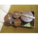Group of five various 19th Century brass and wooden fishing reels
