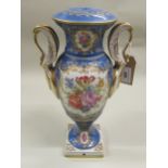 Early 20th Century French porcelain table lamp in the form of a two handled pedestal urn, 12.75ins