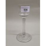 Antique pedestal drinking glass, the floral and bird etched conical bowl above a plain stem and