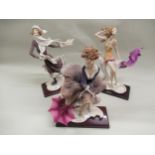 Set of three Florence Giuseppe Armani figures of a girl skater, girl with an umbrella and a girl