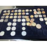 Aluminium attaché case containing a collection of miscellaneous World coins