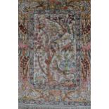 Small Persian silk and woollen wall hanging decorated with various animals and birds, suspended from