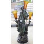 Reproduction dark patinated bronze figural table lamp with three colour flecked glass shades, 83cm