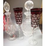 Two good quality cut glass decanters, two ruby overlay drinking glasses and other miscellaneous