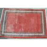 Serabend carpet with a typical all-over stylised Boteh design on a red ground with multiple borders,