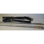 Hardy Deluxe two piece graphite fly rod with original bag, together with another Hardy two piece fly
