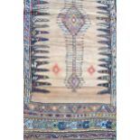 Small Kelim rug with a hooked pole medallion design on a beige ground with skirt panels, 208 x