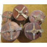 Group of five 19th Century brass and wooden Starback fishing reels