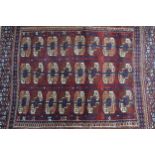 Small Turkoman rug with three rows of eight gols on a wine ground with borders, 104 x 91cm