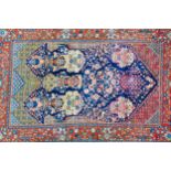 Kashan vase rug with a midnight blue field and floral pattern border, 202 x 135cm