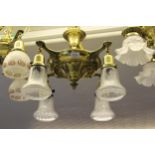 American brass hanging ceiling light fitted with four frosted and etched glass shades Good overall