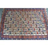Kazak rug with an all-over stylised floral design on an ivory ground with triple border, 190 x 151cm
