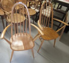 Pair of Ercol open stickback armchairs with stamp dated 1960