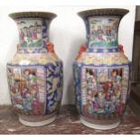 Pair of large reproduction Chinese Canton baluster form vases painted with panels of figures on a