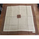 Burberry, London, navy blue silk scarf, 65cm square, together with another, 80cm square and a