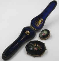 19th Century yellow metal stickpin in original box and two oval micro mosaic brooches decorated with