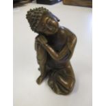 20th Century Chinese bronze figure of seated Buddha, 16cm high together with a similar carved wooden