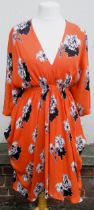 Issa dress of orange, floral and black and white print design, size S Small hole to V neck