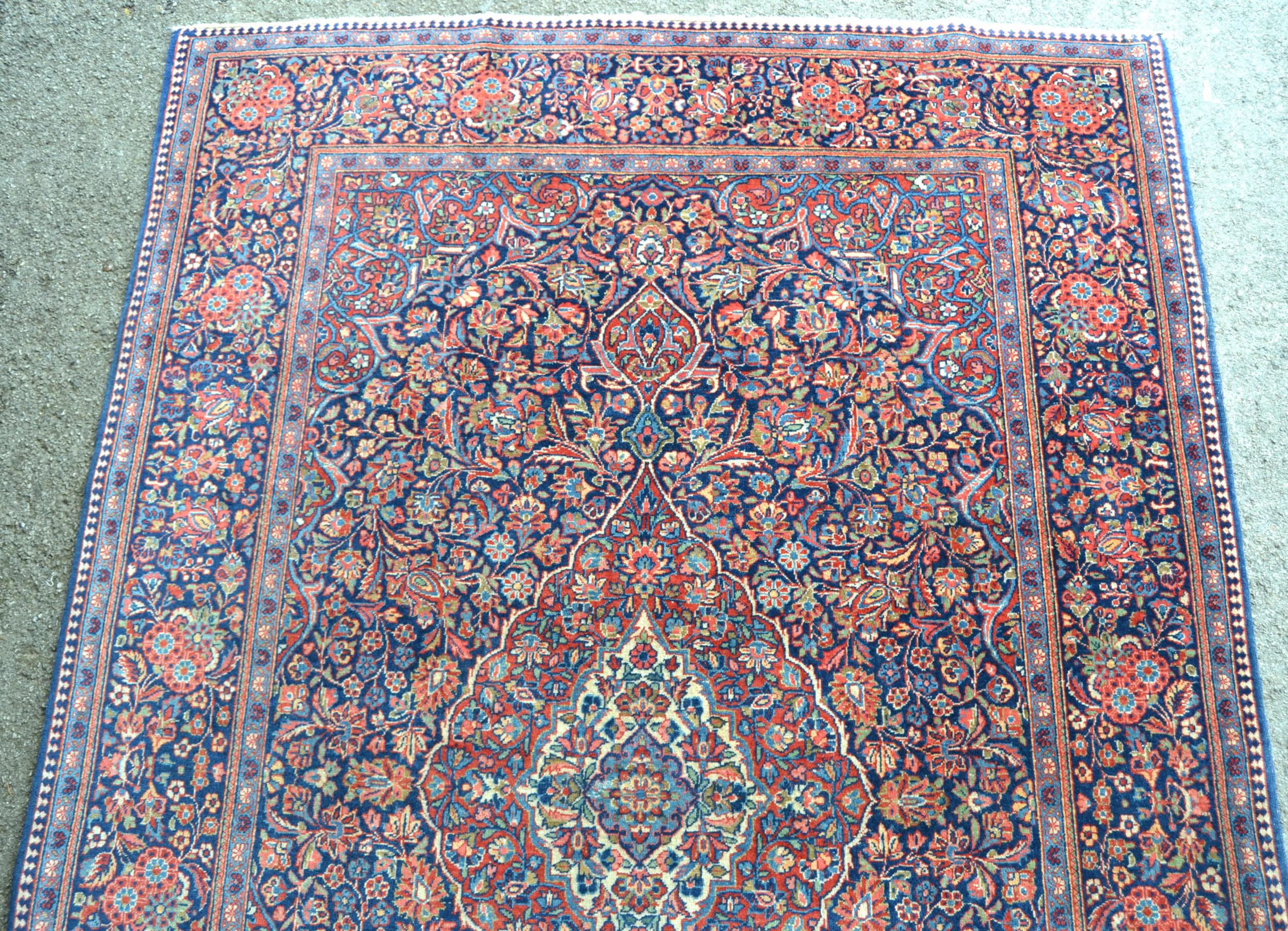Kashan rug with a busy lobed medallion and floral design on a midnight blue ground with borders, 201 - Image 3 of 6