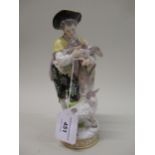 Meissen figure of a shepherd leaning on a tree stump and reaching for a letter carried by a pidgeon,