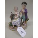 Meissen group of a boy, girl and goat emblematic of Autumn, 16cm high (restoration)