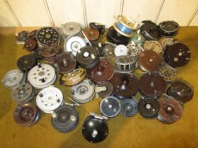 Collection of vintage centre pin fishing reels and spools, various makers