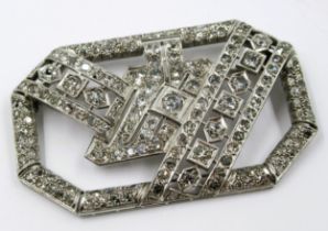 Large Art Deco style high carat white metal and diamond set brooch of irregular octagonal form,